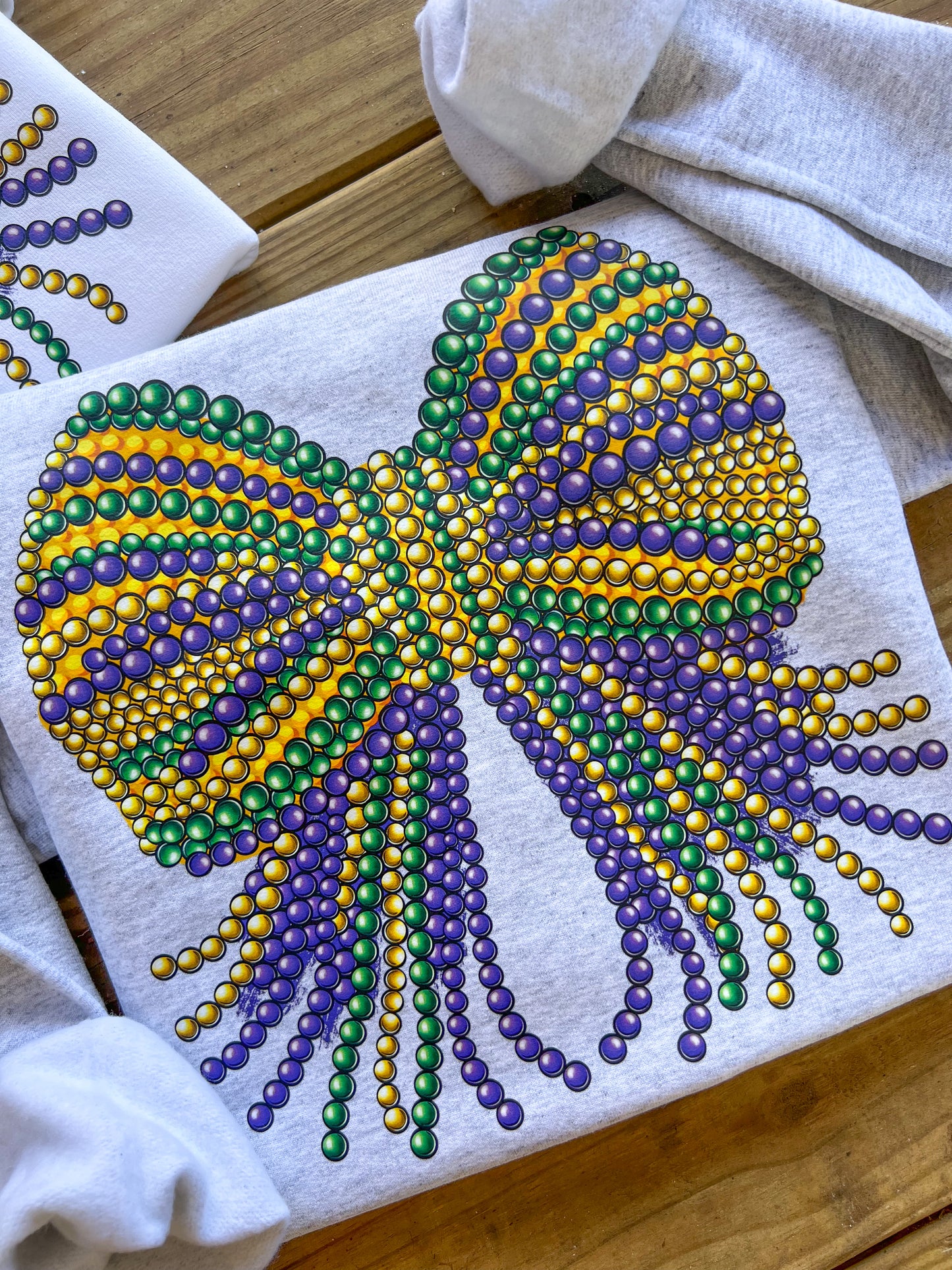 Mardi Gras Bead Bow Sweatshirt