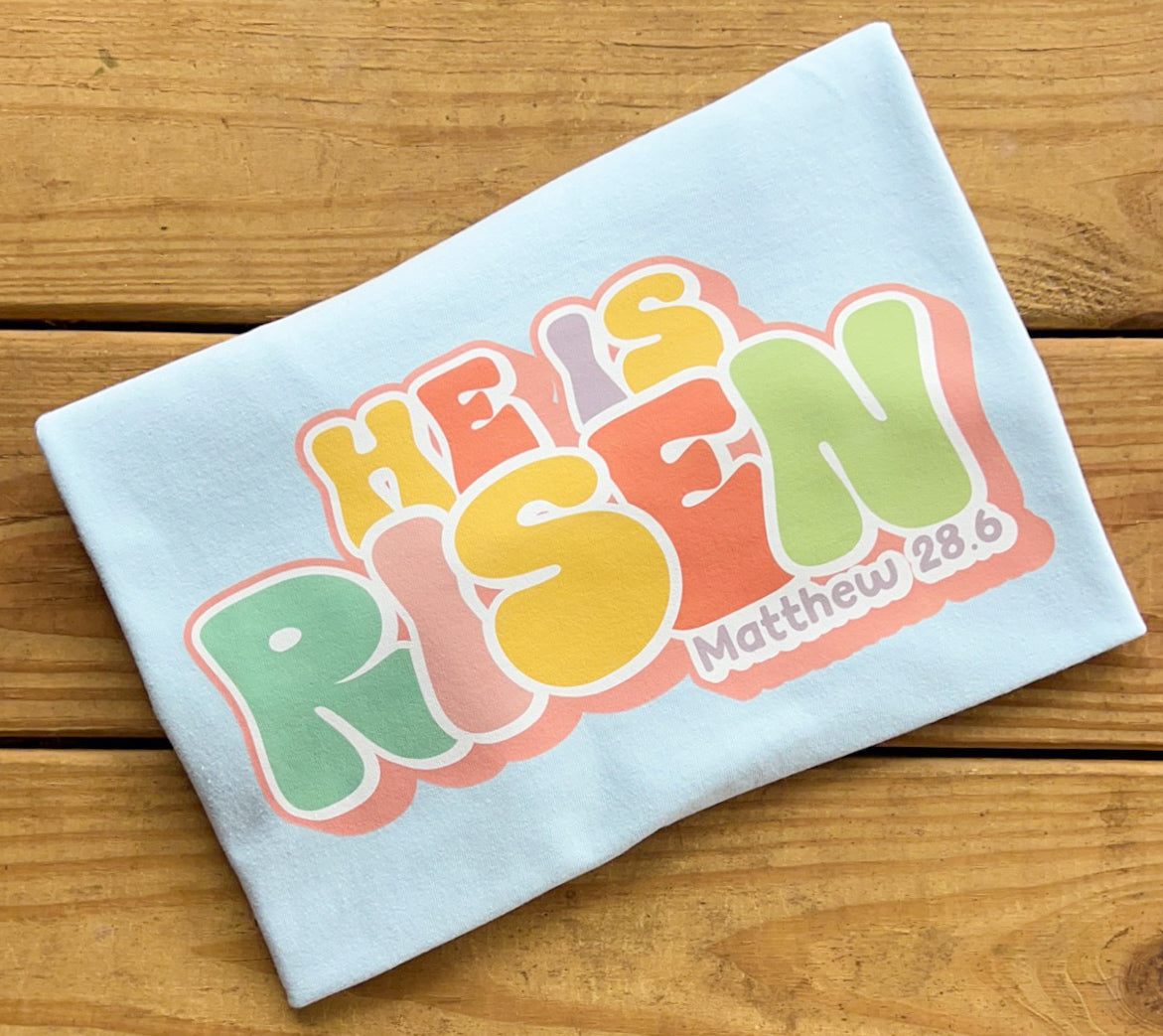 He is Risen Groovy Letters - Comfort Colors T-Shirt